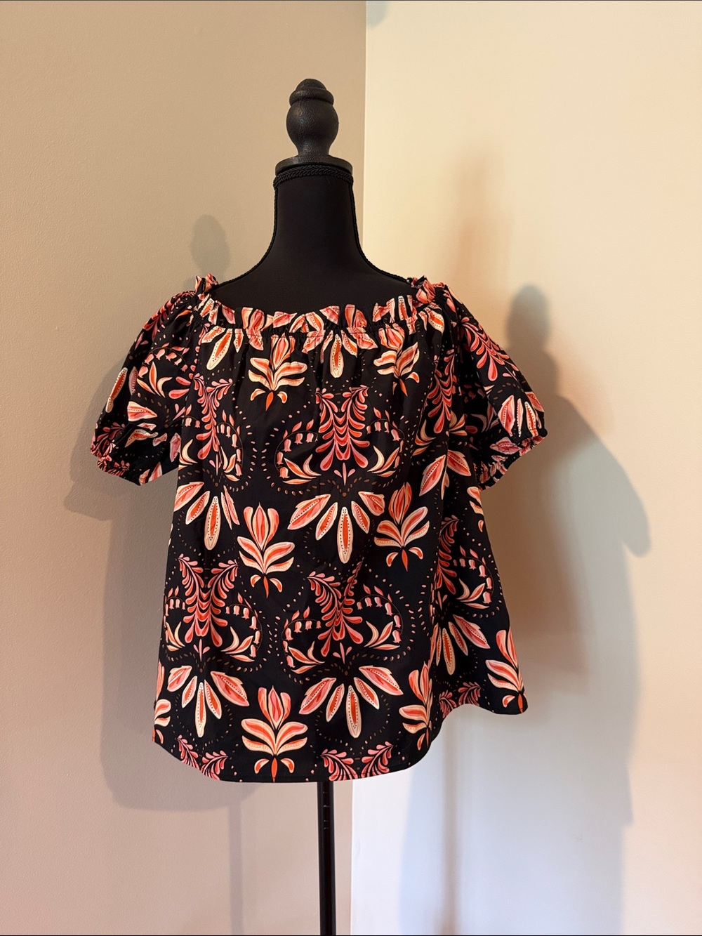Black Off-Shoulder Floral Top in orange and black